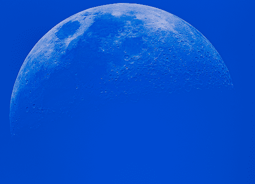 Moon against a blue sky