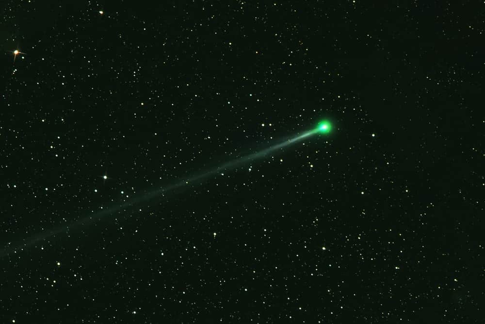 Green comet in space
